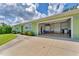 Open garage with a utility sink and laundry at 7727 9Th Avenue Nw Dr, Bradenton, FL 34209