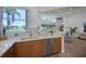 Modern kitchen with stainless steel appliances, granite countertops and views of the outdoors at 7952 Hampton Ct, University Park, FL 34201