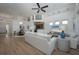 Bright and airy living room featuring hardwood floors, comfortable seating, and stylish decor at 7952 Hampton Ct, University Park, FL 34201