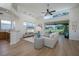 Bright living space with an open layout, elegant decor, and seamless access to the outdoor patio at 7952 Hampton Ct, University Park, FL 34201