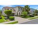 Well-maintained two-story home with a spacious driveway and manicured lawn at 843 Molly Cir, Sarasota, FL 34232