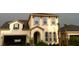 Two-story home with a clean, well-maintained exterior and a two-car garage at 843 Molly Cir, Sarasota, FL 34232