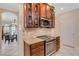 Well-equipped kitchen features granite countertops, tile backsplash, and stainless steel appliances at 843 Molly Cir, Sarasota, FL 34232