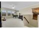 Spacious upper living area offers ample seating, a piano, and plenty of natural light at 843 Molly Cir, Sarasota, FL 34232