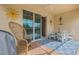 Outdoor patio area with ample seating and direct views of the screened-in pool, perfect for entertaining at 843 Molly Cir, Sarasota, FL 34232