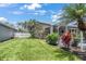 The lush backyard provides a serene outdoor space at 8579 54Th Avenue E Cir, Bradenton, FL 34211