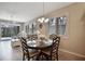 Bright dining room with a round wood table and chairs at 8579 54Th Avenue E Cir, Bradenton, FL 34211