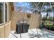 Outdoor grilling area with grill on the screened-in patio at 8579 54Th Avenue E Cir, Bradenton, FL 34211