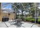 Screened patio overlooking a tranquil lake creates a serene retreat at 8579 54Th Avenue E Cir, Bradenton, FL 34211