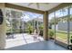 Screened lanai with seating area provides a peaceful outdoor space at 8579 54Th Avenue E Cir, Bradenton, FL 34211
