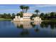 Entrance to the Heritage Harbour community with water features and landscaping at 8906 Stone Harbour Loop, Bradenton, FL 34212