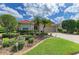 Charming single-story home with well manicured front yard, a two-car garage, and lush landscaping at 8906 Stone Harbour Loop, Bradenton, FL 34212