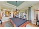 Entertaining game room with pool table and view to the kitchen and screened lanai at 8906 Stone Harbour Loop, Bradenton, FL 34212