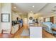 Modern kitchen featuring white cabinets, breakfast bar, and open layout at 8906 Stone Harbour Loop, Bradenton, FL 34212