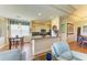 Kitchen featuring white cabinetry, breakfast bar, and stainless steel appliances at 8906 Stone Harbour Loop, Bradenton, FL 34212