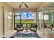 Inviting screened lanai with comfortable seating and a scenic view of the lush lawn at 8906 Stone Harbour Loop, Bradenton, FL 34212