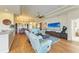 Open concept living room with dining area and view of other rooms at 8906 Stone Harbour Loop, Bradenton, FL 34212
