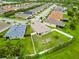 Aerial view of a home with a fenced yard in a well-maintained residential neighborhood at 8937 Excelsior Loop, Venice, FL 34293