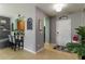 Inviting foyer featuring tile floors and views to the kitchen at 8937 Excelsior Loop, Venice, FL 34293