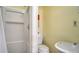 Compact bathroom featuring a stand up shower, toilet and sink at 1116 S Moonmist Ct # M12, Sarasota, FL 34242