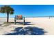 Siesta Beach sign on a beautiful white sand beach, inviting visitors to relax and enjoy the scenery at 1116 S Moonmist Ct # M12, Sarasota, FL 34242