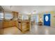 Kitchen and dining area with maple cabinetry and granite counters at 1116 S Moonmist Ct # M12, Sarasota, FL 34242