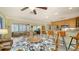 Open living area with eat-in kitchen and additional seating at 1116 S Moonmist Ct # M12, Sarasota, FL 34242