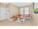 Charming breakfast nook featuring bench seating and natural light at 11324 77Th E St, Parrish, FL 34219