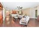 Spacious living room with hardwood floors, open to the kitchen at 11324 77Th E St, Parrish, FL 34219