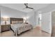 Comfortable bedroom with a ceiling fan, window and matching nightstands at 1301 Backspin Dr, Englewood, FL 34223