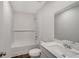 Modern bathroom with white subway tile, vanity and updated fixtures at 13125 Bayberry Way, Parrish, FL 34219