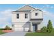 Rendering of a two-story home showcasing modern design with neutral colors and a well-maintained lawn at 13129 Bayberry Way, Parrish, FL 34219