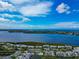 Aerial view of waterfront condos with community pool access and boat access on the water at 1316 Perico Point Cir, Bradenton, FL 34209