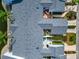 An aerial view of townhouse roofs, decks, walkways and landscaping at 1316 Perico Point Cir, Bradenton, FL 34209