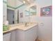 Cozy bathroom with vanity, sink, and decorative accents at 1316 Perico Point Cir, Bradenton, FL 34209