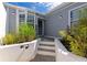 Inviting front entrance with well-maintained landscaping and neutral exterior paint at 1316 Perico Point Cir, Bradenton, FL 34209
