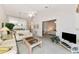 Open living space featuring seating, a table, and view to the bedroom at 1316 Perico Point Cir, Bradenton, FL 34209