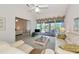 Open living area with patio access and a view into the bedroom at 1316 Perico Point Cir, Bradenton, FL 34209