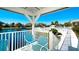 Relaxing view of the pool area from a shaded veranda with comfortable seating at 1316 Perico Point Cir, Bradenton, FL 34209
