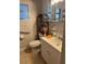 Compact bathroom featuring a vanity, a single sink, and tile flooring at 1506 S 78Th S St, Tampa, FL 33619