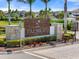 Elegant community entrance sign for Palmero Sarasota surrounded by lush landscaping at 15316 Shady Palms Ln, Nokomis, FL 34275