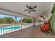 Relax on the screened lanai overlooking the sparkling pool, perfect for outdoor entertaining and Florida living at 15440 County Road 675, Parrish, FL 34219