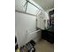 Walk-in closet featuring a hanging rod, shelving for shoes and overhead storage space at 1553 Stewart Dr # 513, Sarasota, FL 34232