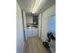 Functional laundry area with washer, dryer, and storage at 1553 Stewart Dr # 513, Sarasota, FL 34232