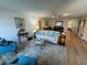 Spacious living room is staged with area rug and comfortable furniture at 1553 Stewart Dr # 513, Sarasota, FL 34232