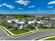 Aerial view of a community showcasing its clubhouse, swimming pool, and landscaping at 17333 Savory Mist Cir, Bradenton, FL 34211