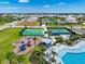 Aerial view of community with pools, playgrounds, tennis courts, and beautiful landscaping at 17333 Savory Mist Cir, Bradenton, FL 34211