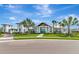 Spacious clubhouse with modern architecture, lush landscaping, and a welcoming entrance at 17333 Savory Mist Cir, Bradenton, FL 34211