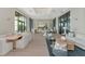Spacious clubhouse featuring ample seating, stylish decor, and a bright, welcoming atmosphere at 17333 Savory Mist Cir, Bradenton, FL 34211