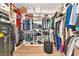 Large walk-in closet featuring custom shelving and plenty of room for storage at 17333 Savory Mist Cir, Bradenton, FL 34211